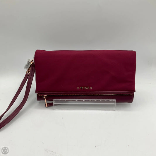 Wristlet Designer By Tumi, Size: Medium